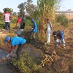 Nkhamenya Youths Clean Up River to Combat Waste Pollution